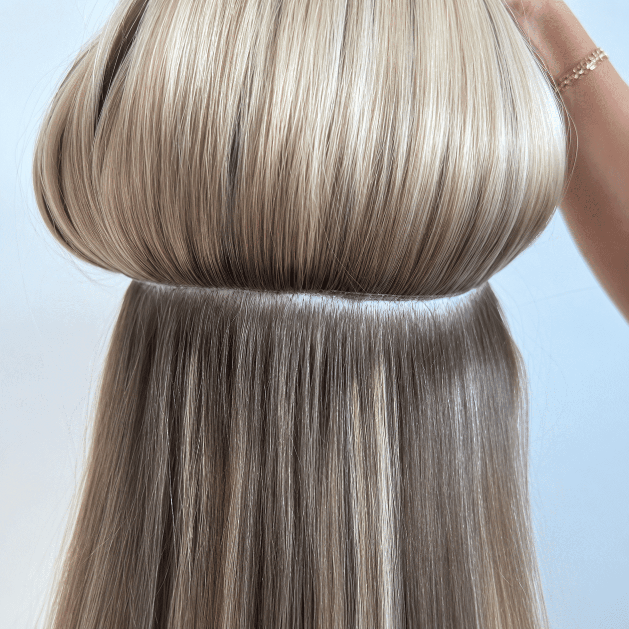 Hair extension showing a smooth blend of natural and added hair.