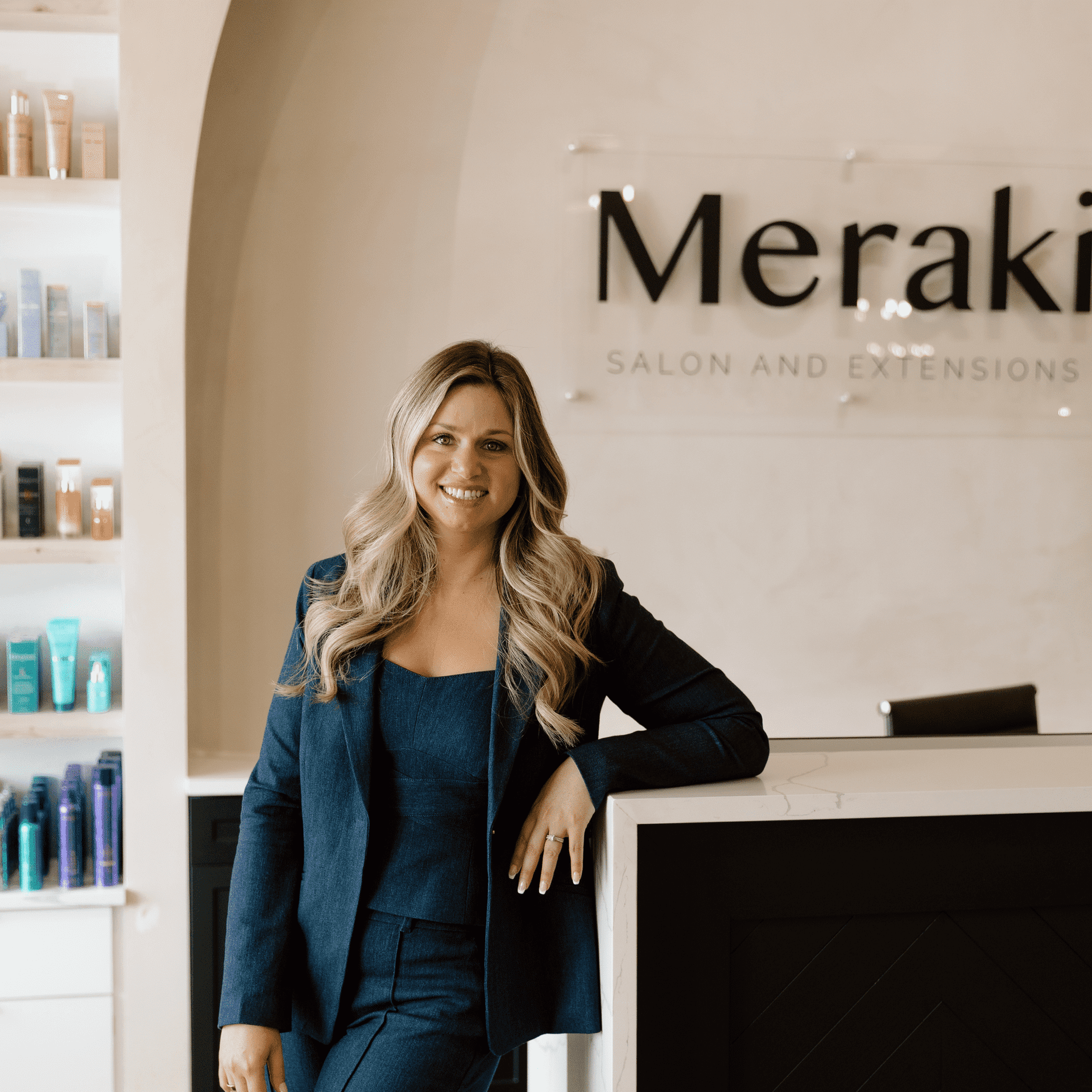 Portrait of Jess, a professional stylist at Meraki Salon And Extensions, showcasing their expertise and style.