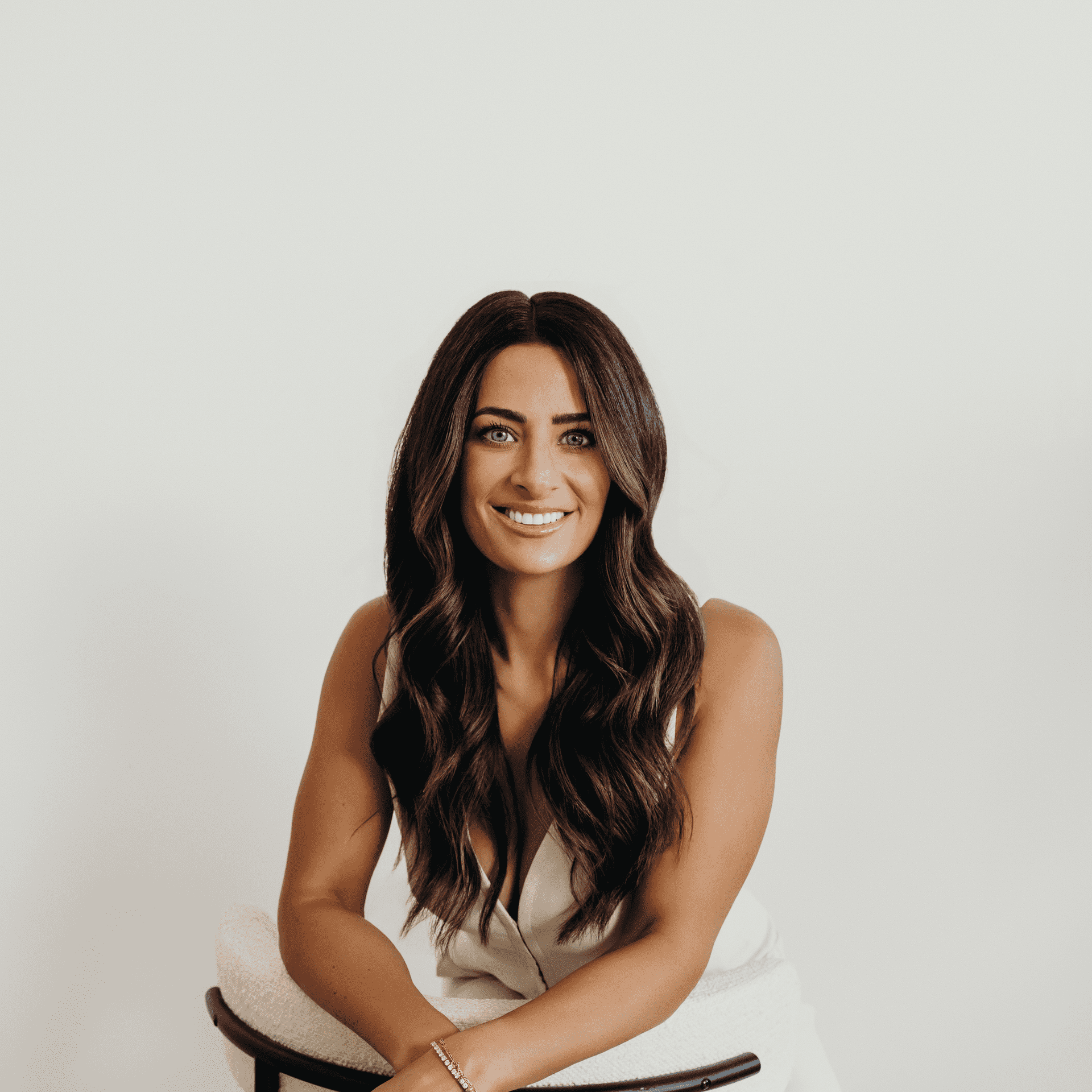 Portrait of Pauline, a professional stylist at Meraki Salon And Extensions, showcasing their expertise and style.